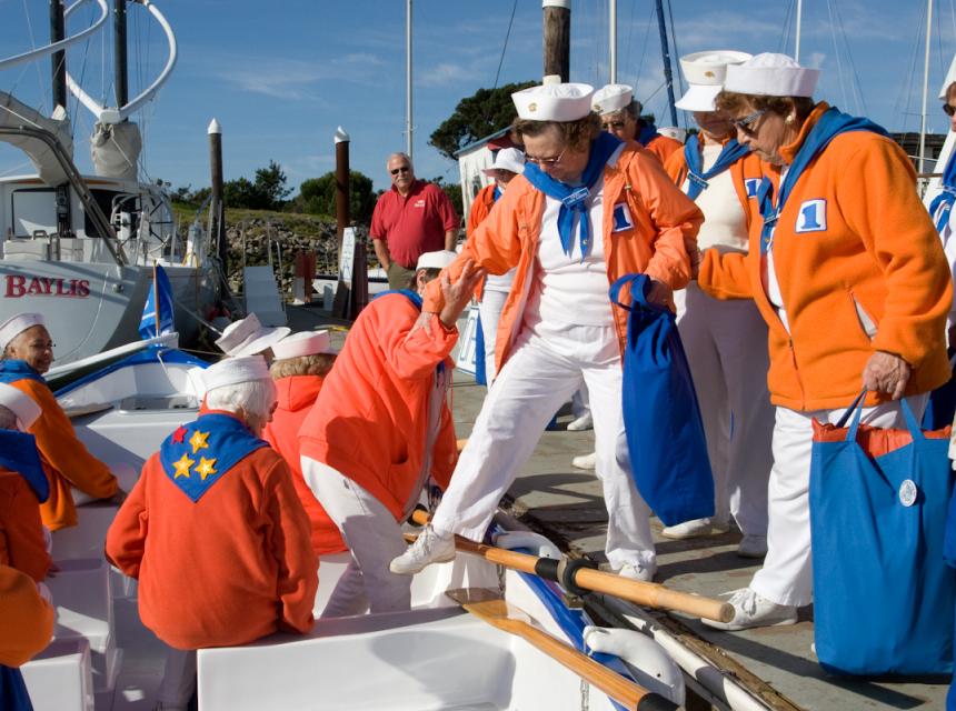 Ladies of the Lake, in full regalia, step aboard Siren Song